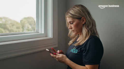 Tiffany Ling produced spot for Amazon Business featuring woman wearing VIDA shirt by a window