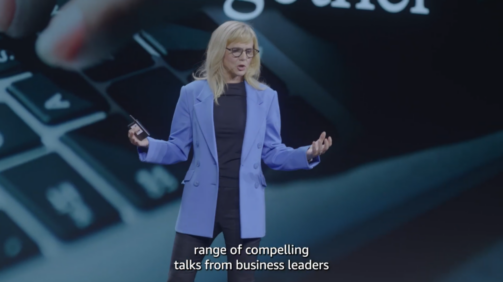 Tiffany Ling produced recap for Amazon Web Services Summit in Toronto speaker in front of keynote screen